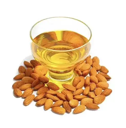 Cold-pressed sweet almond oil in a glass dish